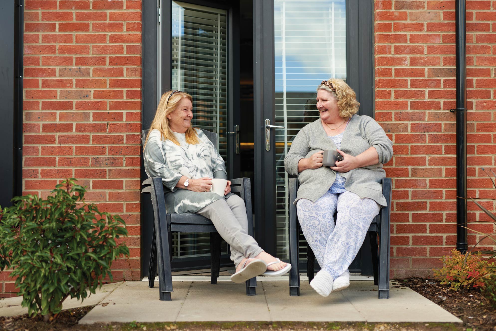 Two people sat down enjoying time together